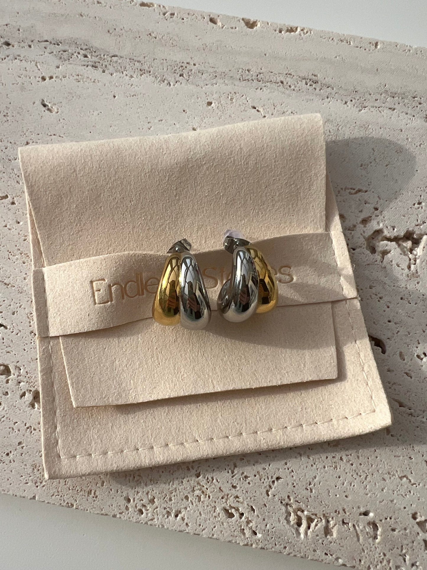 mixed metal hoops flatlay