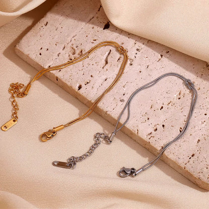 Thin knotted bracelet both cols