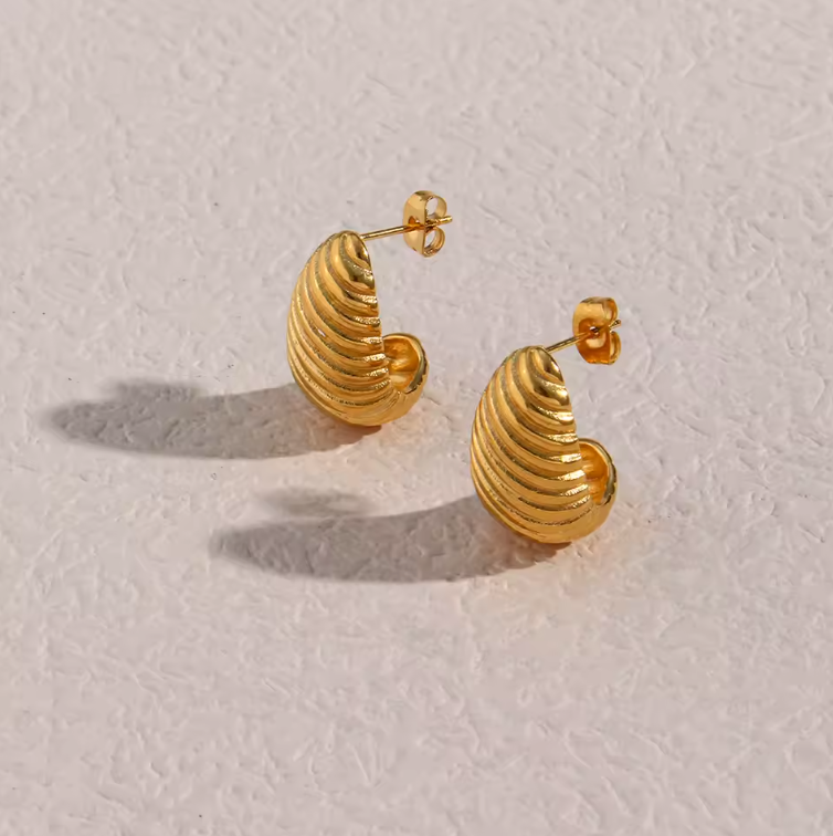 croissant drop stud earrings flatlay