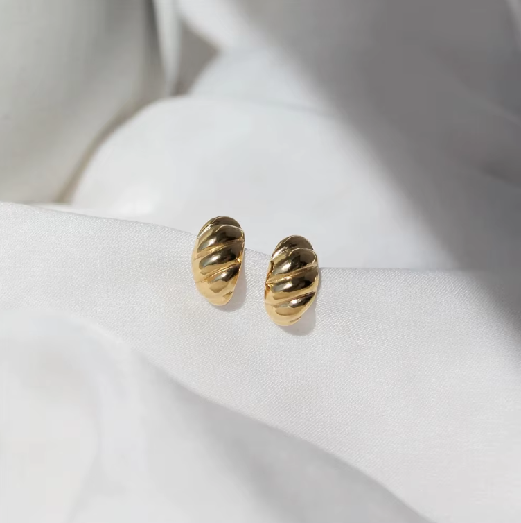 croissant studs gold flat shot