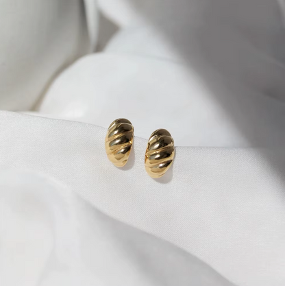 croissant studs gold flat shot