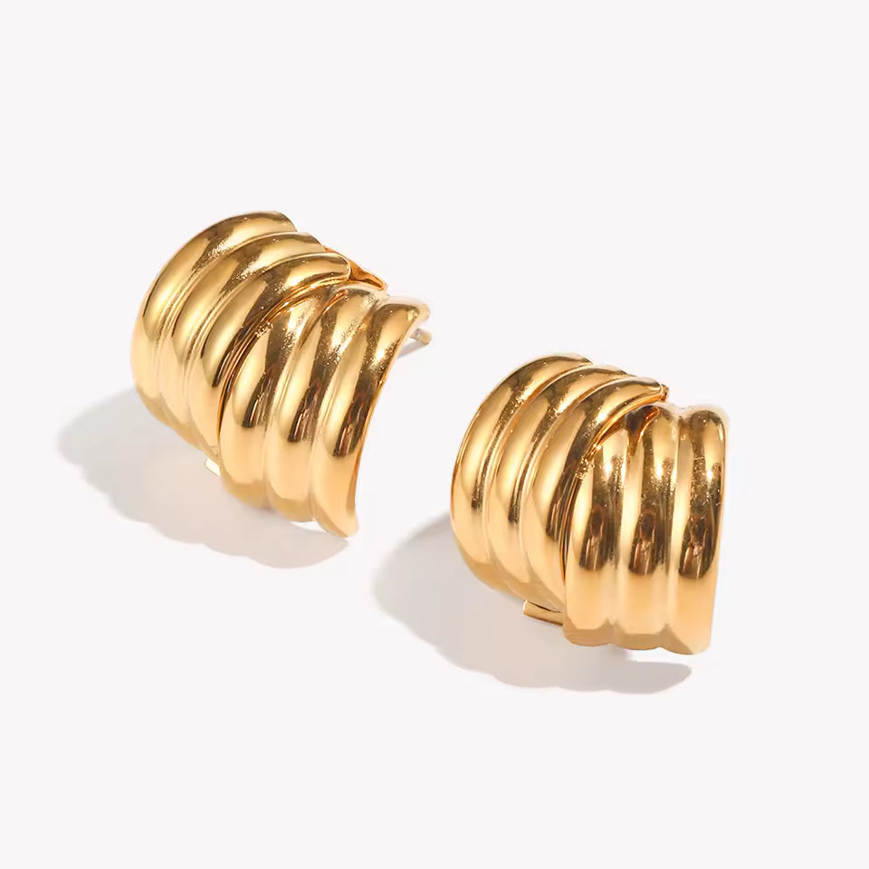 Layered gold stud earrings
