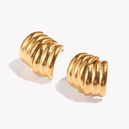 Layered gold stud earrings