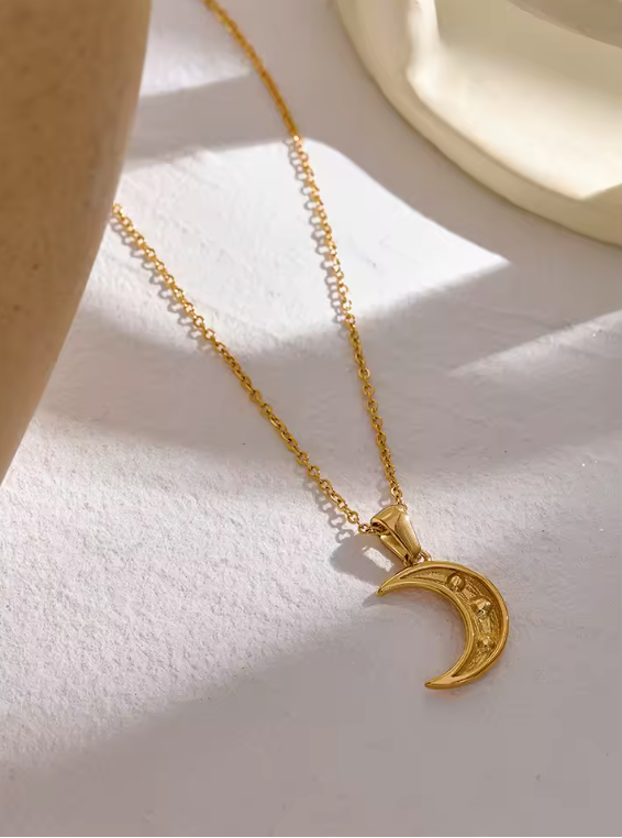 Gold moon & star CZ pendant