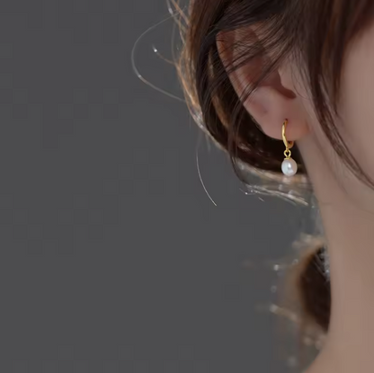 Pearl drop huggie hoop earrings