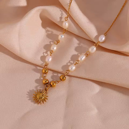 Pearl sun necklace