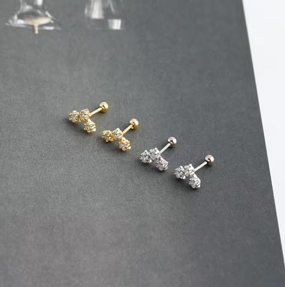 star cluster barbell stud earrings flat lay