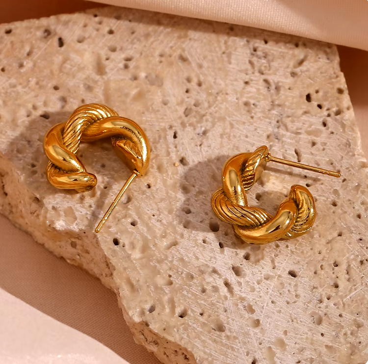 twist hoop earrings flat lay shot