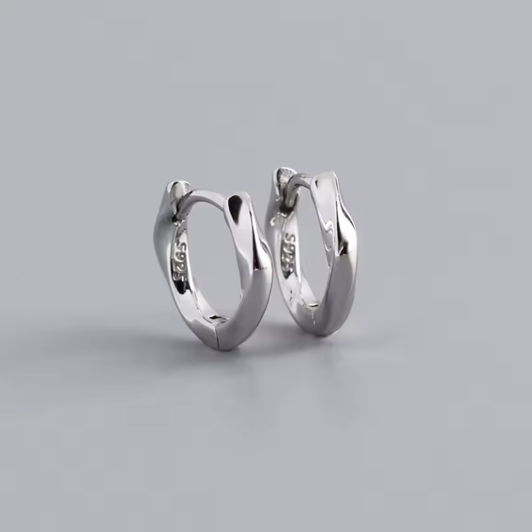 Twist huggie hoops