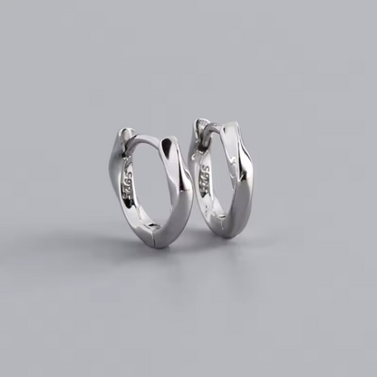 Twist huggie hoops